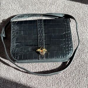 Black leather Banana Republic cross body purse.